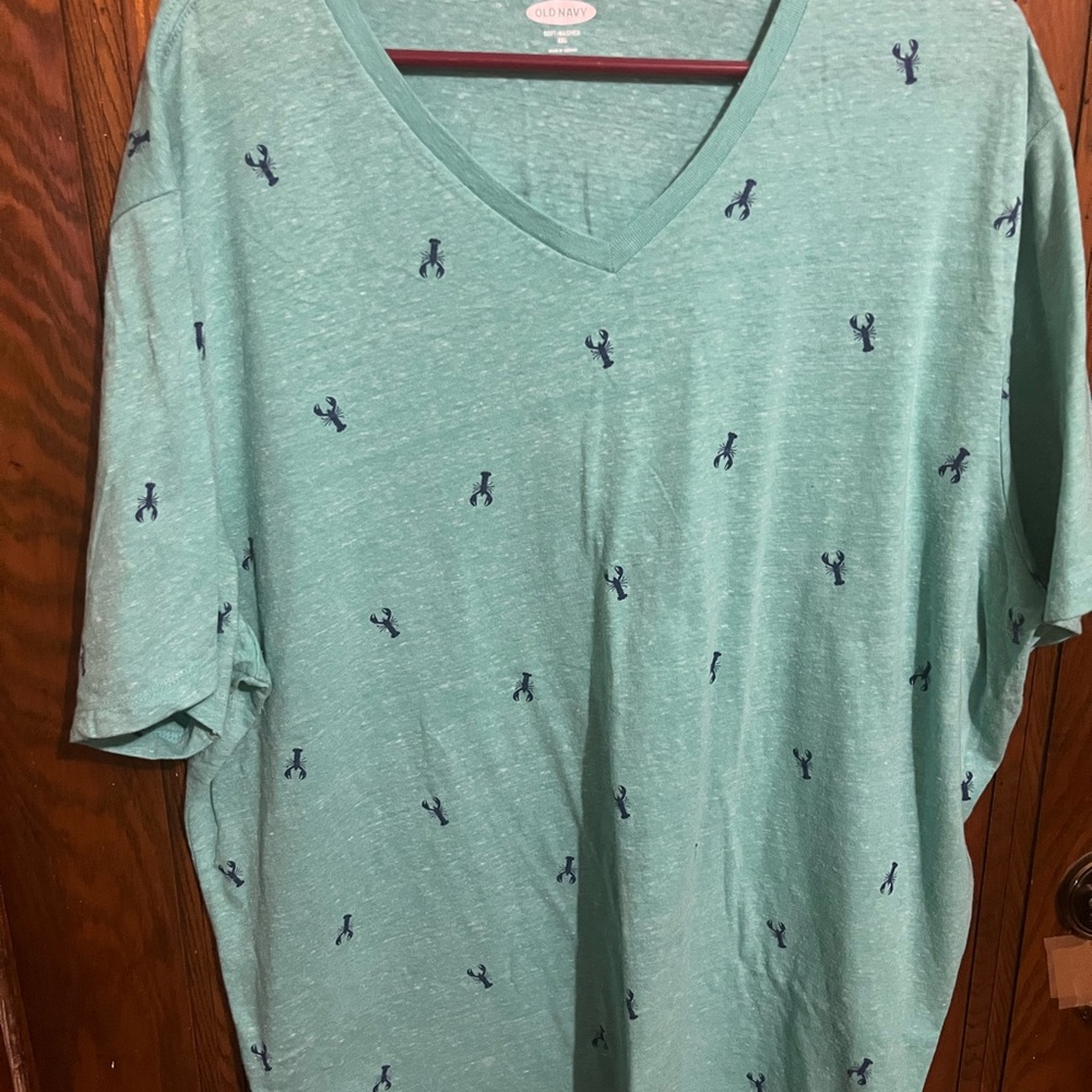Both shirts are size 2x one is v neck.